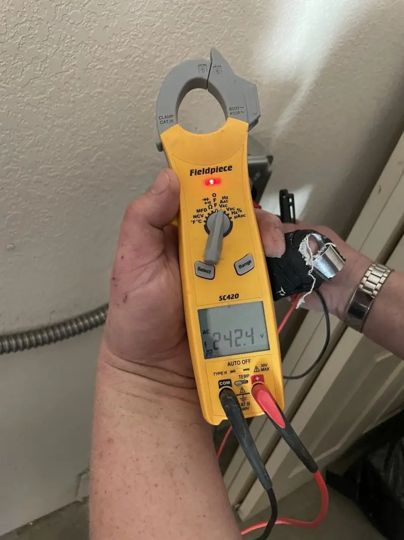 Voltage testing with clamp meter during Generator Installation in Snellville